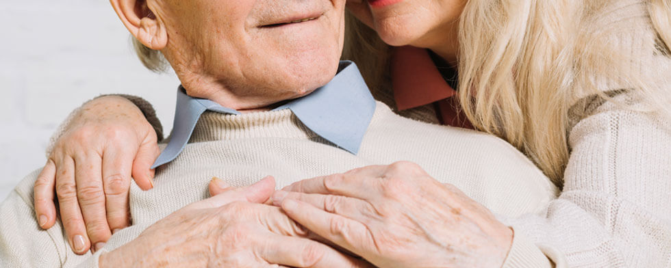 old couple hugging